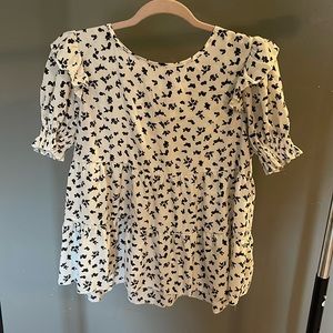 Floral blouse with bow tie in back. Medium.